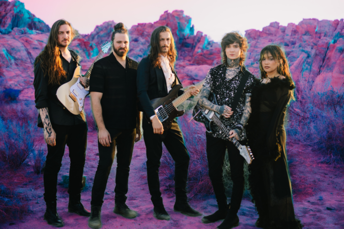 The band Polyphia with singer Sophia Black from their 'ABC' music video