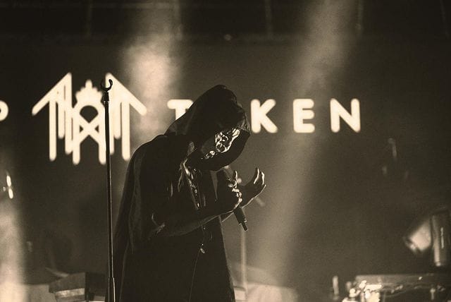 Vessel singing into a microphone