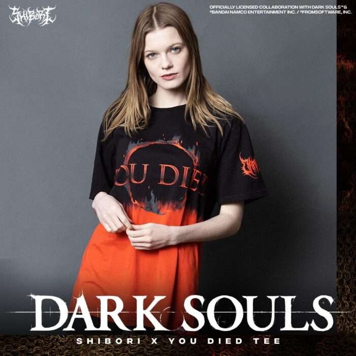 A woman wearing a 'You Died' Dark Souls shirt made by Shibori Threads