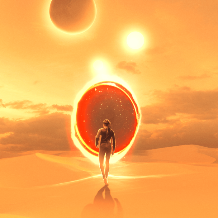 Solomon's Gate; woman in front of a portal in the desert under a sunny sky.